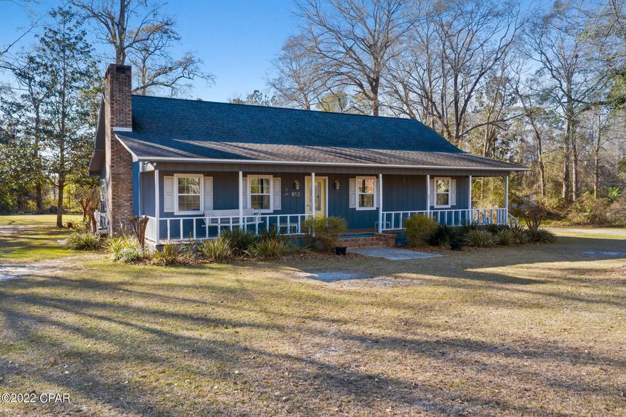 Beautifully renovated from top to bottom! This spacious 3 bedroom, 2 bath house peacefully sits on a large 1+ acre lot in the heart of Chipley! Inside features include new laminate flooring, custom trim work, a spacious living room with gas fireplace, formal dining area, Florida room, updated kitchen with granite countertops, farmhouse sink, stainless steel appliances and new cabinets. The master suite boasts his/her vanity, massive walk-in closet and custom tiled shower with glass door. Outside you will find luscious landscaping, rear concrete patio, covered front porch and a 40x46 workshop with two roll up doors. Home is located on a quiet dead-end road, walking distance to schools, shopping and the hospital.