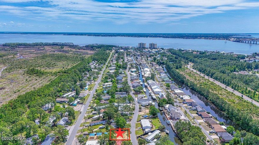 Affordable coastal living in Panama City Beach! Why break the bank when you can enjoy the Gulf Coast lifestyle at a fraction of the cost? This vacant lot in Bayside Park allows mobile homes and offers a great opportunity for a weekend getaway, primary residence, or short- or long-term rental property.

Boating and fishing enthusiasts will love being near Bayside Marina, a newly renovated full-service marina offering valet storage, rentals, and an in-house mechanic. Just minutes by boat from the Gulf, you can be at the island or on your favorite snapper fishing hole by sunrise.

The seller has already brought in fill dirt, making this lot ready for your new home. Best of all -- NO HOA!