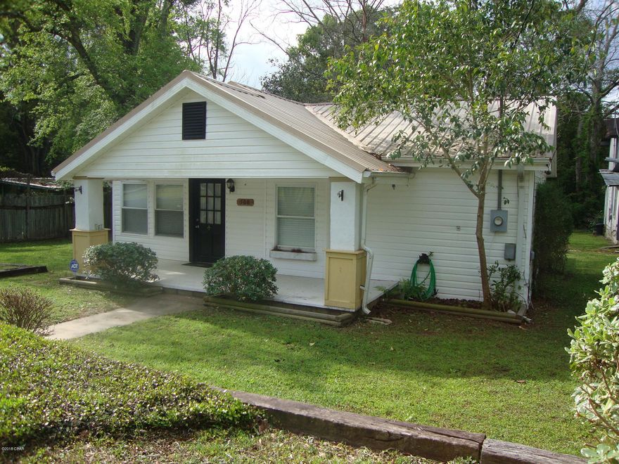 Completely remodeled and updated 2 bedroom 1 bath frame/vinyl home in city limits of Bonifay.  Remodeled and updated in 2008 to include all wiring, central heat and air system, metal roof, vinyl siding and deck. Beautiful hardwood tongue and grove wood floors have been skillfully refurbished and refinished. Custom expert designed cathedral with exposed beam ceilings throughout. Updates give a modern fresh look while preserving some of the old character. Ceramic tile floors in the kitchen, bathroom and laundry room .  Nicely landscaped yards distinctive parking area adds charm to this great home.  Almost like a brand new home. Large 24X40 Metal workshop. Storage building.