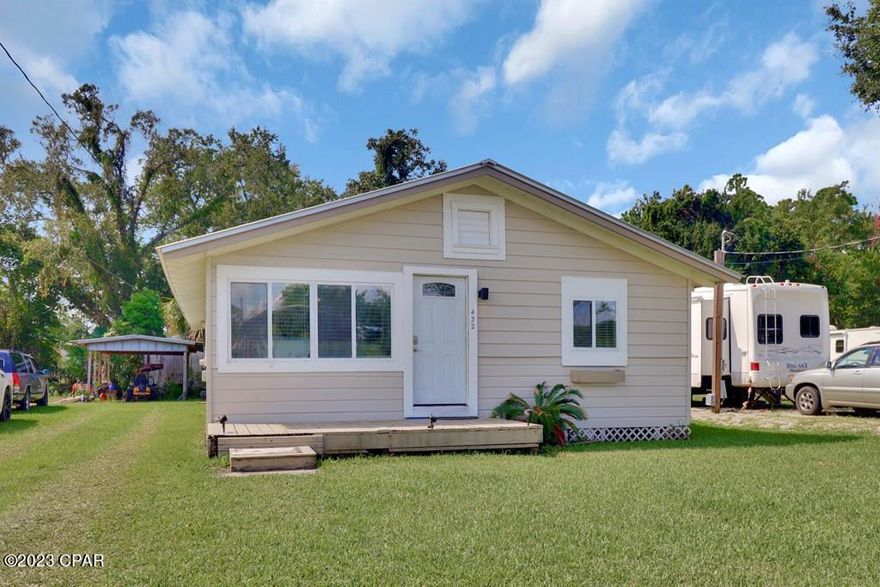 Discover the charm of this quaint Florida cottage nestled in the heart of Oak Grove. This home has been thoughtfully upgraded to a 3-bedroom, 1-bathroom gem during recent renovations, making it a perfect blend of classic character and modern comfort. Step inside to experience the freshness of new flooring, paint, and appliances that infuse new life into the space. The attention to detail shines through, creating a cozy and inviting atmosphere that's perfect for both short and long-term stays. Convenience is at your fingertips with a golf cart ride to downtown, where you can enjoy shopping, dining, and entertainment. If you're seeking the sun, beach access is a short 10-minute drive, while local boat ramps are also in close proximity allowing for a great day on the water. Unwind on the screened-in porch at the back of the house, where you can relish the evening breeze and create lasting memories with family and friends. Experience the perfect balance of comfort and convenience in this delightful cottage.