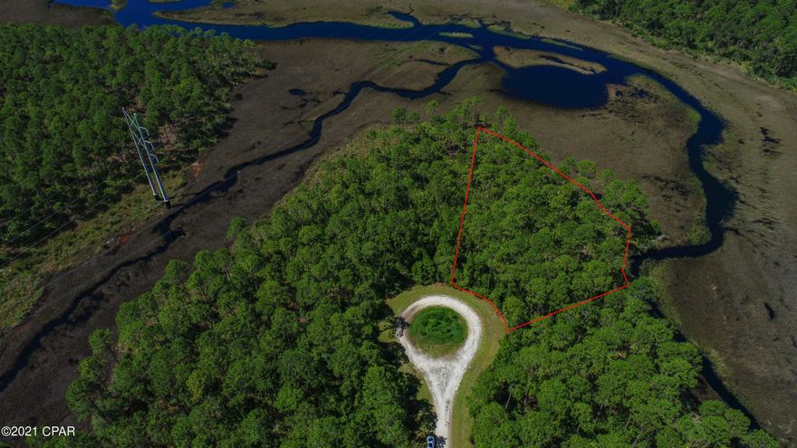 This is the perfect opportunity to build your dream home! Rivercamps is a quaint neighborhood nestled between the Intracoastal Waterway, Crooked Creek and West Bay. This gated community has so much to offer. Linked by extensive trails and boardwalks, the RiverCamps community offers outstanding amenities such as the RiverHouse swimming pool, grill and pavilion, fitness center and a boat ramp on the Intracoastal that leads to the Gulf of Mexico.