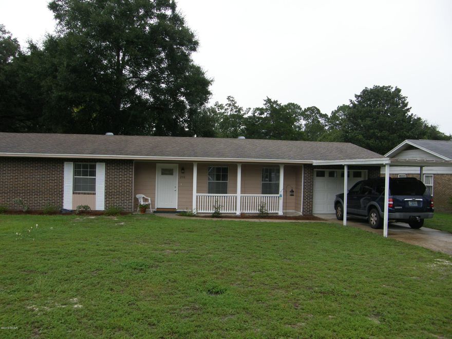 Large 4 Bedroom 2 Bath Brick Home in Callaway.  This home is Completely REMODELED with new floors, kitchen, bathrooms, doors, & Ceiling fans.  Dream Kitchen with lots of cabinets, stainless steels appliances, and center island. Florida Room has large windows showcasing the backyard, heated and cooled with glass sliding doors from Dining area. Quiet street with little traffic.  Deep Lot with access to Lannie Rowe Lake - kayak or canoe.  Lots of parking space with Single car garage, detached garage, and carport. Detached garage could be man cave or work shop.  Lawnmower, boat, or your toys have a steel covered shed as well.  Close to schools, shopping, medical and Tyndall AFB.  Very reasonable price for this little gem.   HOME WARRANTY offered by seller! Move in ready!