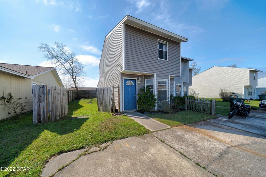 Currently under contract - Taking Back-up offers -  Here is an affordable townhome that is close to all good things in Lynn Haven- Publix, the Post Office and several restaurants and/or coffee shops are within walking distance.  Two good sized bedrooms are upstairs. The main living space, a kitchen, and a half bath are downstairs. There is a storage closet on the exterior as well. With a full price offer, seller will give $2500 in seller concessions for new kitchen appliances or updates. The yard is already fenced in the back for you, so don't miss this one!