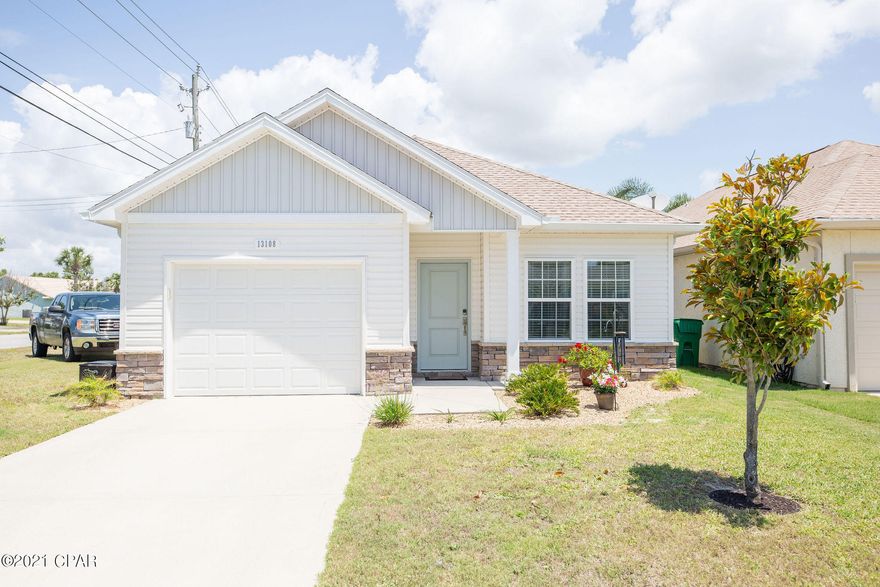 One half mile walk to the beach and your toes are in the sand! This immaculate, new construction home built in 2017 is on a great corner lot just a short walk or golf cart ride to the World's Most Beautiful Beaches! Upgraded lighting, LVP flooring, tiled kitchen backsplash, quartz countertops, landscaped front yard and fenced backyard... literally nothing needs to be done to this home. Bring your things and move right into this lovingly maintained home just steps from the beach!