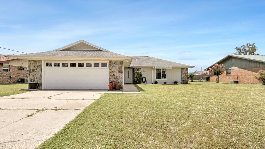 NEWLY  UPDATED HOME located in friendly neighborhood, close to Tyndall. It features a beautiful Kitchen with GRANITE COUNTERS, LARGE ISLAND and STAINLESS APPLIANCES . The flooring is Luxury Vinyl Plank in a neutral tones. A wood burning fireplace and French Doors add character to the Great Room that also offers a flexible space for a Dining Room or a home Office.  On the outside, there is a large fenced backyard, and a 2 car garage!  Don't wait to see this ''move in'' ready home.