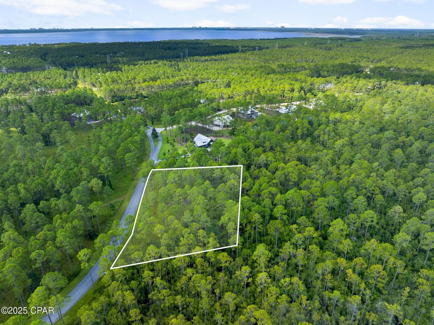 1.75-Acre Premier Homesite in RiverCamps on Crooked Creek - Your Coastal Dream Awaits! 

Discover the perfect setting to build your dream home on this expansive 1.75-acre lot in the exclusive, gated RiverCamps on Crooked Creek community in Panama City Beach, FL. Nestled within a serene 1,500-acre nature preserve, this homesite offers unparalleled privacy and tranquility, surrounded by lush woodlands and bordered by three stunning bodies of water: Crooked Creek, West Bay, and the Intracoastal Waterway. With over 1,500 acres dedicated to conservation, this lot provides a rare opportunity to live in harmony with nature while enjoying modern conveniences.

This spacious lot features a generous buildable area, ideal for crafting a custom retreat tailored to your vision. The lot's prime location within RiverCamps ensures easy access to the community's unmatched amenities, including a private boat ramp with direct access to the Gulf of America, unlimited use of kayaks and canoes, over seven miles, dry boat storage, and day-use boat slips.

Located just 10 minutes from Northwest Florida Beaches International Airport and 10 miles from the pristine white sands of Panama City Beach, this homesite combines the peace of a secluded retreat with proximity to vibrant coastal attractions. Enjoy fishing, boating, hiking, or simply soaking in the natural beauty of this wildlife sanctuary, home to over 100 species of resident and migratory birds.

RiverCamps on Crooked Creek is a gated community with fewer than 450 homesites, ensuring exclusivity and a tight-knit community feel. HOA fees of $729/quarter include association management, boat ramp access, fishing rights, and more, with no build-out time requirement, giving you flexibility to plan your dream home at your own pace. Utilities, including public sewer, water, and electricity, are available for seamless development.

Don't miss this chance to own a piece of paradise in one of Panama City Beach's most coveted communities. Contact us today to schedule a private tour and start envisioning your future in RiverCamps on Crooked Creek