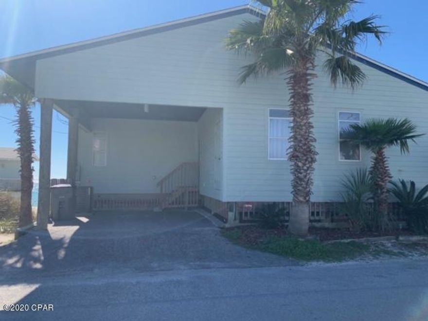 3 bedroom, 2 bath, open concept gulf front home.  Located adjacent to St. Andrews State Park.  New HVAC, water heater, windows and roof.  Open kitchen with 10ft. cathedral ceilings.  Access to the wrap around deck from each bedroom.  This is way too good to pass up!