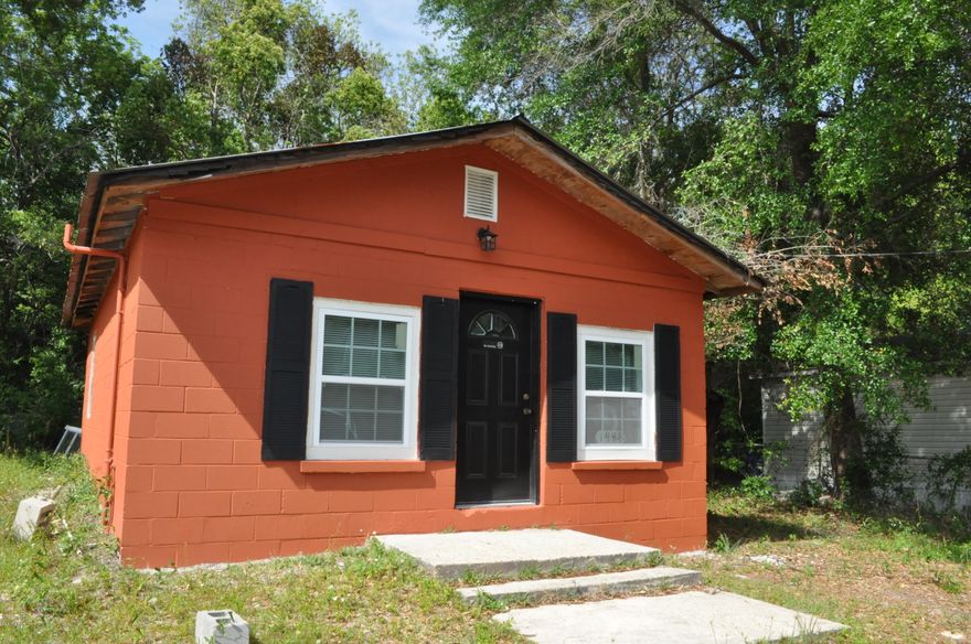 Charming Florida style cottage with 1BR/1BA.  Everything is brand new! All tile flooring for easy maintenance, some built-ins, washer/dryer hookups and the metal roof is less than a year old.  Great starter home or investment property!  You're just down the street from the Springfield Community Center and park, and only 5 minutes from shopping, schools, restaurants and Tyndall AFB.  All info is approx. and must be verified by Buyers if important.