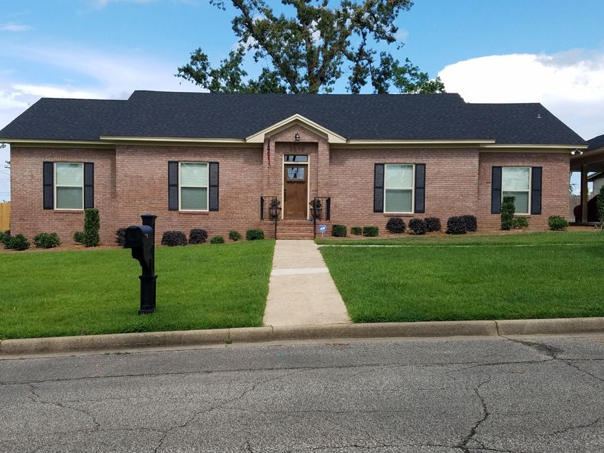 Beautifully Updated - this home is Amazing!   Open Concept with a beautifully updated kitchen, living and dining area. The custom cabinets include a wired Island, granite counter tops and stainless appliances.  Beautiful LED lighting make the colors blend and give this home a beautiful setting.  Landscaped with sprinkler system, this corner lot is close to Jackson Hospital and Chipola College.  Larger Bedrooms and updated beautiful baths. This home has newer electrical wiring, fans and lights.  Newer insulated windows, newer HVAC and new foam insulation make this home easy to heat and cool with low energy bills. The added carport has attic storage for more space!   You just have to see this home to know all the beautiful things it offers.  Call today to see this home!