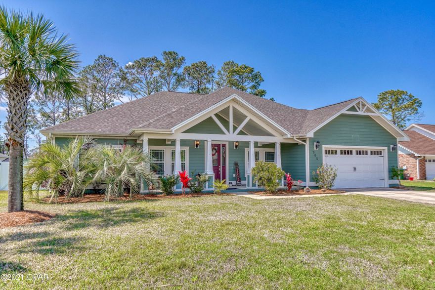 WELCOME to 305 Eagle Drive in Colony Club Harbour located in Panama City Beach, Florida! This wonderful craftsman home is located a mile or so from the ever-expanding Pier Park shopping center and a short distance to many community beach access points. This home is located on Holiday Golf Club (Hole #11) but has a nice buffer between the course and the generous back yard. A pool was installed a few years ago with fully enclosed screened lanai creating a wonderful outdoor living space just off the large living area. Enter from a large covered front porch into the foyer with dining room off to the right, move forward to the great room that opens to the kitchen. The great room features 11-foot boxed ceiling with crown molding and recessed lighting. The home offers 4 full bedrooms and 3 full bathrooms on one level with a 2-car garage. This is a wonderful home in a great community with a ton of local conveniences and amenities nearby.  Schedule a tour of 305 Eagle Drive while you still can.  This lovely home will not last long!