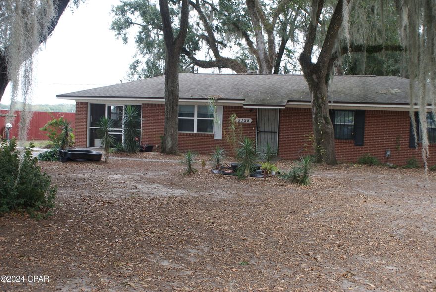 Price SLASHED!!!  Must see to appreciate this lovely brick home situated on a 1-acre parcel surrounded by several grand oaks, arrayed with Spanish Moss. The property is conveniently located near Highway 71 with nearby grocery and shopping options.