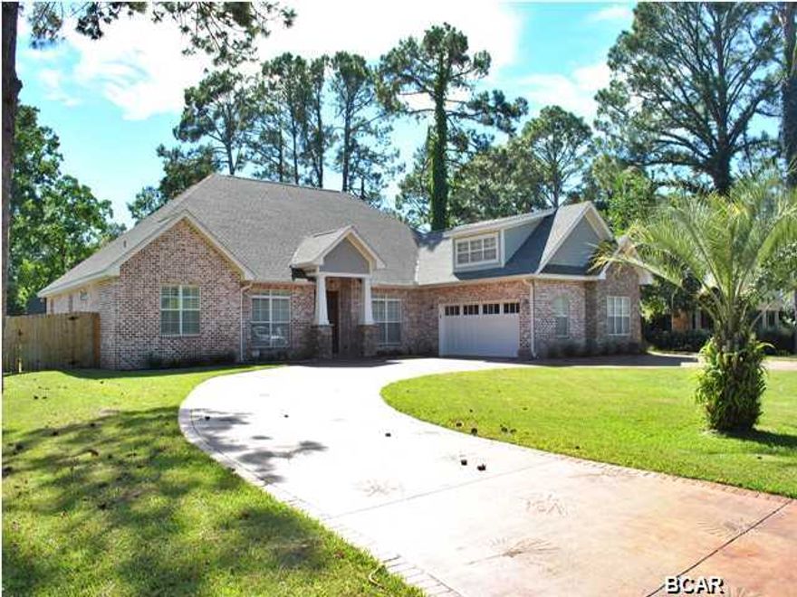 Fabulous like new executive waterfront (canal) home built by Koehnemann Construction. This home was custom built with all the bells and whistles. Large foyer greets you with a formal Dinning and Formal Living. Flooring throughout is hardwood flooring and like new carpet in the bedrooms. Large kitchen with granite counter tops and breakfast bar. Kitchen has a great floorplan overlooking the family room with fireplace, as both kitchen and Family Den overlook the pool and canal. Ten foot Tray ceilings with crown molding throughout, oak wood flooring and built-in bookcases are just some of the numerous amenities throughout the home. The split bedroom incorporates a large master bedroom on the first floor, with private access to the pool and back yard. Master bath has separate shower