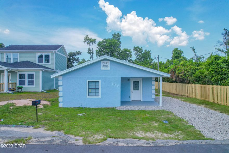 'CURRENTLY UNDER CONTRACT, SELLER ACCEPTING BACKUP OFFERS' Exceptional property with an in-law suite, this beautiful 3-bedroom, 2-bathroom home is a true gem. Located just around the corner from Martin Lake and the bay, the location of the newly remodeled home is very convenient to TAFB, downtown, and all of Panama City. Step inside to discover new LVP flooring in the bedrooms and main living areas, providing both style and practicality. Fresh paint inside and out, a new AC, plus a new roof are just a few of the upgrades.
An absolutely amazing feature of this property is the detached in-law suite, perfectly nestled just behind the main house. This versatile space could serve many possibilities, including generating rental income. For those with a boat or camper, worry no more! The spacious pole barn is large enough to park your outdoor toys, providing easy access to outdoor adventures. Call today for a private viewing!