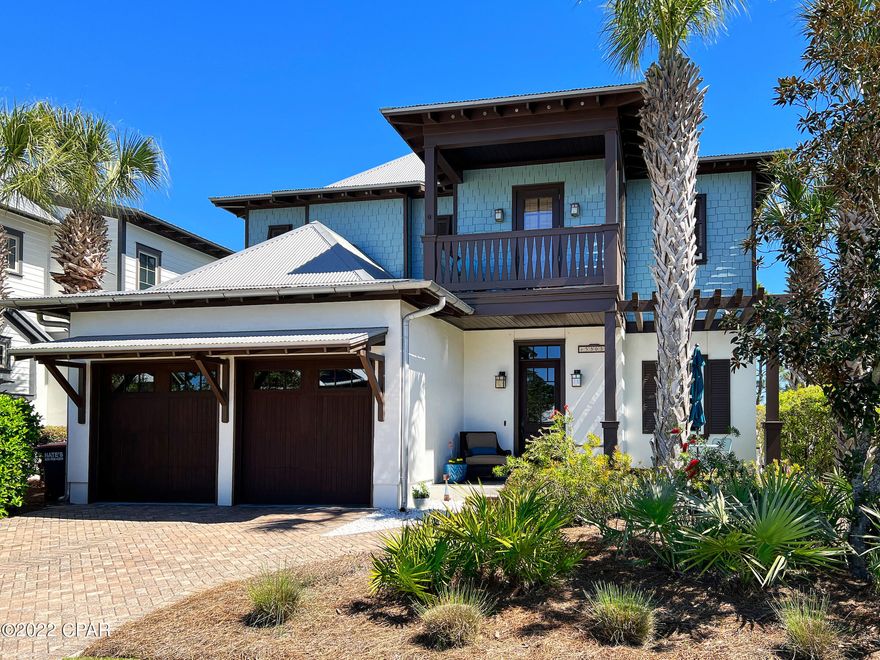 UNDER CONTRACT - ACCEPTING BACKUP OFFERS. Absolutely gorgeous home, in the much sought after gated beach community of Martinique. This unique and stunning home is one that you must see. From the moment you step inside, you will love the bright and airy feel of this home. The kitchen features top of the line stainless steel appliances and is open to the oversized living room area. The high ceilings have the added detail of custom-made wood beams. The living area flows into a peaceful and spectacular outdoor living area that has a hot tub, outdoor fireplace, and waterfall. This is a wonderful space for entertaining and overlooks a small pond in a serene courtyard oasis with lots of privacy. The downstairs also features a large room that can be used as a large office or formal dining area with a powder room. The home features custom made lighting throughout and beautiful hard wood floors. The upstairs area has three nice size bedrooms. The master bedroom features a large balcony that overlooks the back yard and pond with views of Saint Andrews Bay. The stunning master bath has double vanities, large soaker tub, separate walk-in shower, and the tile work is just beautiful. There is also a large walk-in closet. There are two more bedrooms and a bathroom also upstairs. One of the bedrooms has a balcony that overlooks the front of the home. This home has two separate HVAC units and one is brand new. The home has a top of the line smart thermostat that can be controlled from anywhere. 

Martinique is a tranquil, peaceful neighborhood with walking trails, a community pool and playground with a Rosemary Beach feel. It was designed in a way that encompasses its natural surroundings. It is also within walking distance to several of the beaches best restaurants, the beach and marinas. You will fall in love with this charming neighborhood and this stunning home. All sizes, ages and measurements are approximate; buyer to verify if important.

HOA covers upkeep & general maintenance of the neighborhood, road maintenance, common areas, gate maintenance, pool, playground, trails, basketball court, and landscaping in common areas.