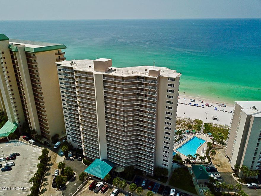 MULTIPLE OFFER SITUATION: Highest & Best due by noon/9-4-18. One of the most sought out condo complexes in all of Bay County! This 2 bedroom 2 full bathroom unit in Dunes of Panama Resort has it all! This updated condo invites comfort with sprawling entertaining spaces you'll enjoy the perfect setting for relaxing or entertaining. The spacious kitchen features granite countertops, updated cabinets, stainless microwave, stove and dishwasher, tiled back splash and a large breakfast bar. Beautiful updated floors flow throughout this units open airy layout. The spacious master bedroom with a private balcony door creates the perfect setting for relaxing while you listen to the waves crash upon the beach. This condo will have you ready to move in the second you walk in the front door. Overlooking the most beautiful blue water will have you wanting to take a few extra vacations every year so you can enjoy these breathtaking Florida sunsets! Centrally located on the quiet end of Panama City Beach you'll be just minutes from the best dining, shopping, St Andrews State Park, and entertainment. There are endless activities here at Dunes of Panama that will keep you busy for hours on end. Including 3 large pools, tennis courts, shuffleboards, fitness center, tiki bar, and snack shop. Don't miss out on the opportunity to have an income producing vacation condo!
