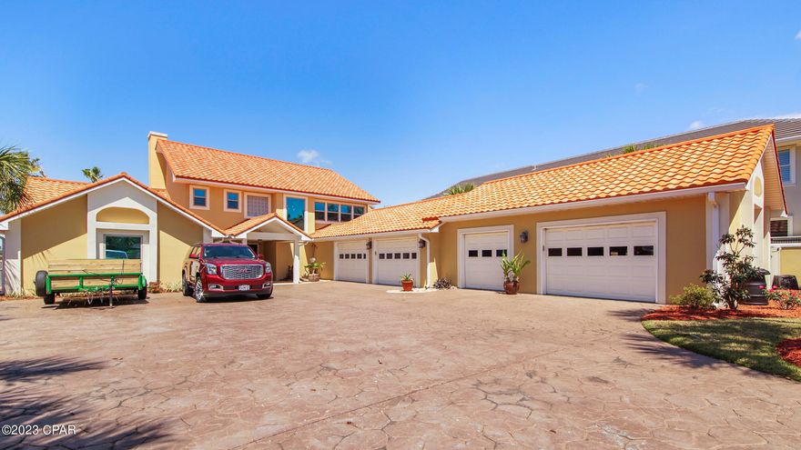 Waterfront beauty with deep water access in Bay Point! One of the few homes on the market with the ability to dock large boats/yachts and be at Shell Island or the Gulf of Mexico in a few short minutes. Enjoy breathtaking open water views with a beautiful back yard filled with palm trees and a swimming pool. The updated interior includes custom cabinetry, granite, stainless appliances, a double sided fireplace, a spacious open living room, a sauna and more. The master bedroom is upstairs with waterfront views and a large updated master bathroom. Bay Point is a gated community located on Grand Lagoon with security, golf courses, tennis, full service marina, restaurants, on site post office, and more. Call today for your private showing.