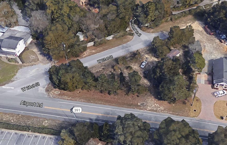 PRIME SPOT ON BUSY AIRPORT RD! OVER 200' of Frontage on Airport rd and additional access via W 21st ST. Zoned GC-2, which includes usage also under GC-1. See Documents in Listing for more info. Near Banks, Hospitals, Professional Offices, and more. Booming area of town! Excellent Visibility with additional access. Build your office here! Sold As-Is. Buyer to confirm all aspects of lot size, function, improvements, and general use.