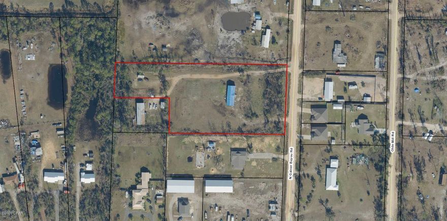 Residential lot in Southport with 3 Septic tanks, 2 wells, and 3 power poles with underground electric. This property is ready for building or new mobile homes. There is a large hurricane damaged mobile home currently on the property just waiting to be renovated. All measurements are approximate, verify if important.
