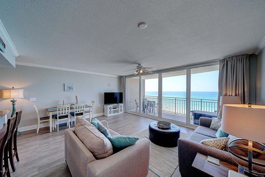 Beautiful coastal condo now for sale at Emerald Beach!  This turn key condominium, on a desired low floor, features 2 full baths, and 1 bedroom plus bunks in the hall, and a spacious balcony with gorgeous views.  The seller has recently upgraded the flooring, paint and furniture. HVAC and hot water heater both replaced in 2018. Emerald Beach Resort offers multiple pools including a gulf front pool with Tiki bar, fun kids pool, fitness center, Sky Bar, convenient on-site Starbucks, 2 parking garages, and  more!  Call today!