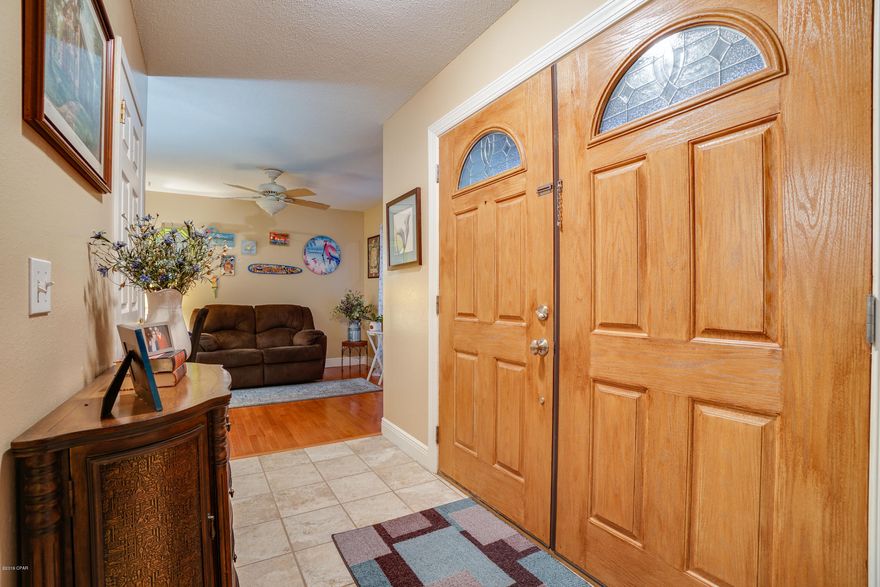 Back on the Market. Financing failed (inspections and appraisal were completed.)  Owners had begun packing so quick move in. When you enter the foyer, the living room is to your left  and office on right. Need space to work from home?  Or set it up for kids to homeschool, you can monitor them  from living or kitchen/ dining area. Kitchen/dining is open concept. The utility room off kitchen is a great work out or craft  area, has walled off storage space as well. There is a screened /sunroom off dining room,you can enjoy with a privacy fenced back yard. Site built 2 car detached garage, pump for the sprinkler systems is located in the garage. Easy to keep grass green.  Both home and garage have a new roof. Minimum damage to home was repaired by license contractor. Great Home!