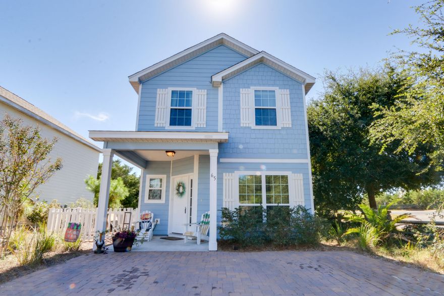 Lovely home in affordable neighborhood with HOA and shared pool. Kitchen features beautiful granite countertops with a breakfast area and french doors to the Patio. Hardwood floors throughout the first floor. Perfect location for a quick drive down Scenic 30-A and only 20 minutes to the new Northwest Florida International Airport.  Only two blocks back from the beautiful Gulf of Mexico!Sellers are offering a comprehensive 13 month Home Warranty with full price offers. Ask your agent for details.Information in this listing is approximate - if important to buyer - please verify.