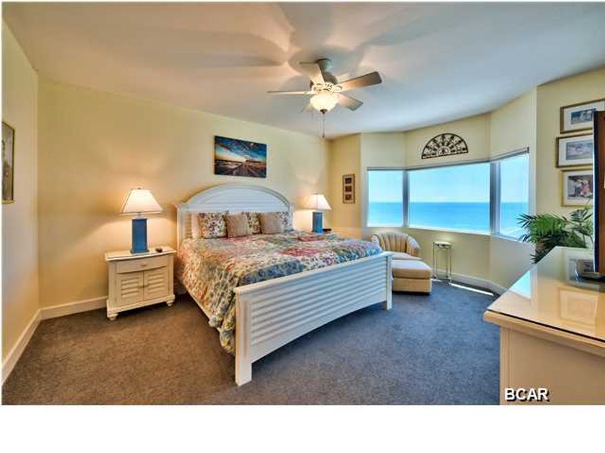 Tidewater 1305 is a must see! This condo is a HUGE two bedroom, two bathroom, gulf front condo with incredible views at Tidewater Beach Resort in Panama City Beach only 1/4 mile from Pier Park. The ''A'' plan at Tidewater features nearly ~1600 sq.ft of living space making it one of the largest two bedrooms on the beach! The open kitchen/dining/living area make this unit a perfect fit for larger families looking for a two bedroom or even those that are just looking for more than the typical square footage offered by the majority of two bedroom units. Tidewater 1305 boasts tile throughout the living area and offers its owner ample storage space within the condo to be able to store all of your personal belongings between visits making it ideal for those looking to operate as a vacation rental as well. The master bedroom is gulf front with beautiful views and balcony access while the master bathroom is a great size featuring a standing shower, garden tub, double vanity, and walk-in closet. The second bedroom is large enough to hold two Queen beds easily and is also attached to the second bathroom. This condo is sold fully furnished and rental ready just in time for peak summer season! It's a great time to get in at Tidewater and capitalize on the peak season rental revenue! Tidewater Beach Resort offers quite possibly the best array of amenities of any development on the beach. Come take a look today!! Amenities include gulf front fitness center with 2 indoor spas, and saunas and steam rooms, two outdoor pools and one heated indoor pool, conference facility, movie theater, an owner's only Sky Lounge, on-site rental department, 24 hour security staff and in-house restaurant and coffee house. One of the best locations on Panama City Beach and is a short walk to Pier Park. Come take a look today!!