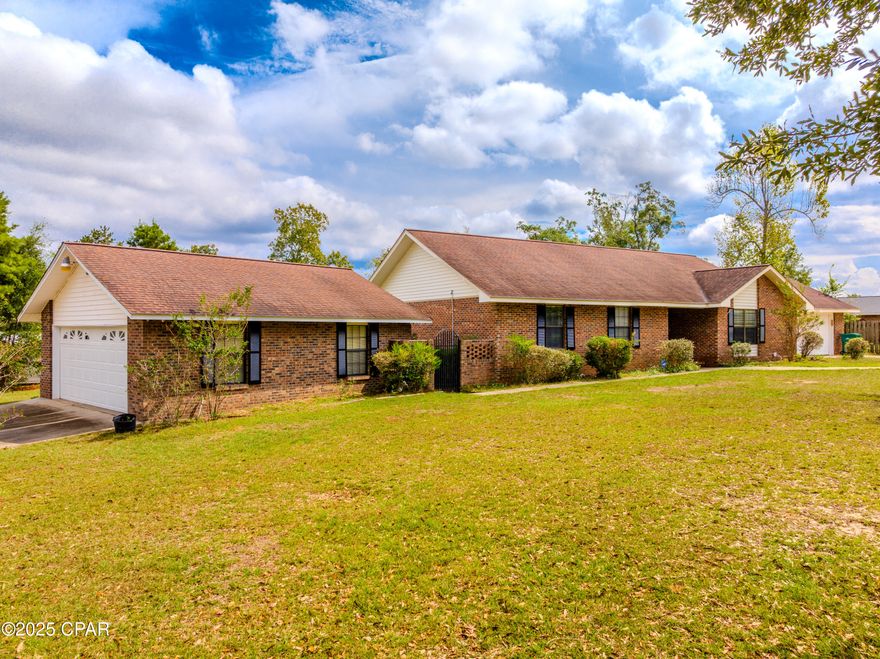 Welcome to this beautiful 3-bedroom, 2-bath brick home located in the highly sought-after Indian Springs community. Sitting on nearly 4 acres, this property features one of the largest lots in the neighborhood — offering the perfect blend of privacy and convenience.

Step inside to find beautiful hardwood and tile floors throughout most of the home. Enjoy your mornings or evenings on the huge screened-in back porch, perfect for relaxing or entertaining.

Outside, you'll find an attached garage, a detached garage/workshop, and a 24x36 pole barn — plenty of space for vehicles, storage, or hobbies.

If you've been searching for a well-built brick home on acreage in Indian Springs, this is your chance!