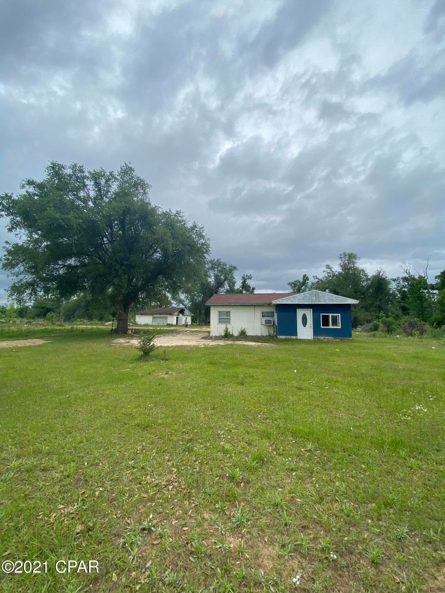 Country living at it's best! Some of property is fenced already. Small home that is move in ready.  Property is situated just minutes from Lake Seminole and the Chattahoochee river.  Home is within 25 minutes of Marianna and under an hour to Dothan, Alabama. Make this your weekend getaway or build your forever home. Options are endless, bring offer today!