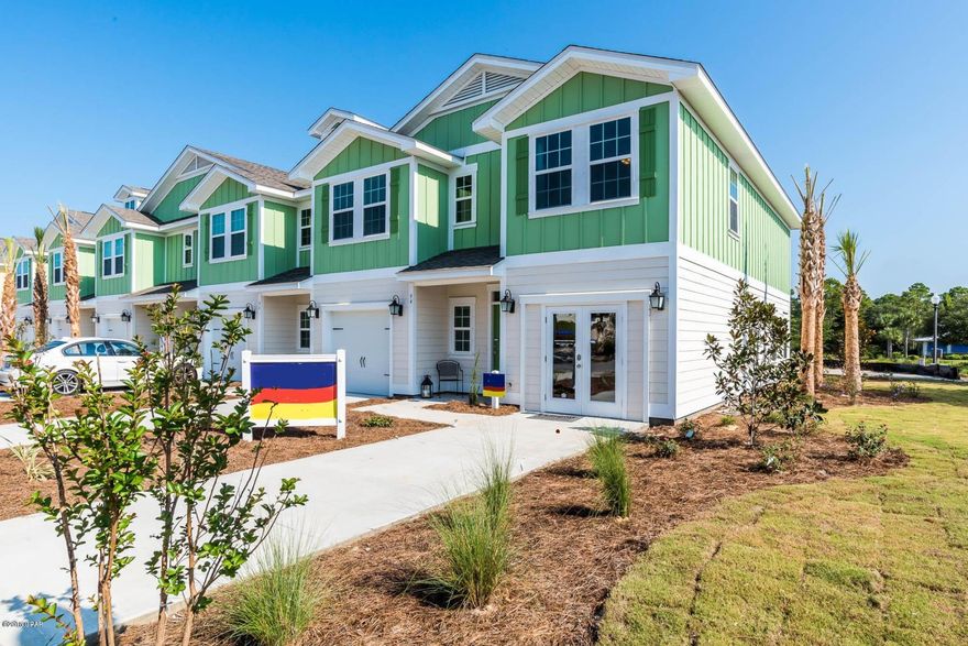 Palm Plan Model! Breath taking design and warming beachy color selections. 3 bedrm , 2.5 bths. Granite Luna pearl countertops in Kit and baths. Shaw Weathered Barnwood vinyl plank floors. Ivory profiled cabinets. Stainless Frigidaire appliances. 9 ' ceilings on main floor w recessed lighting. End unit gives advantage of side windows and loads of natural light in living and master. Tiled shower w clear glass and raised double sink vanity enhances master bath.