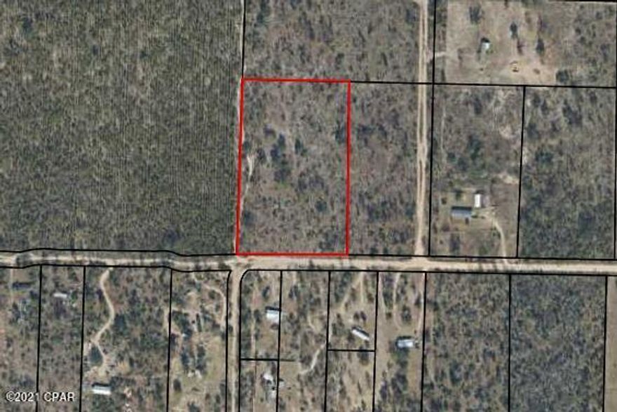 5 acres of residential land located on a peaceful street off Hwy 231. This lot is away from the busyness of living in town but is still just a short drive to schools, shopping, churches and more. Not in a flood zone. Perfect homestead with room to roam!