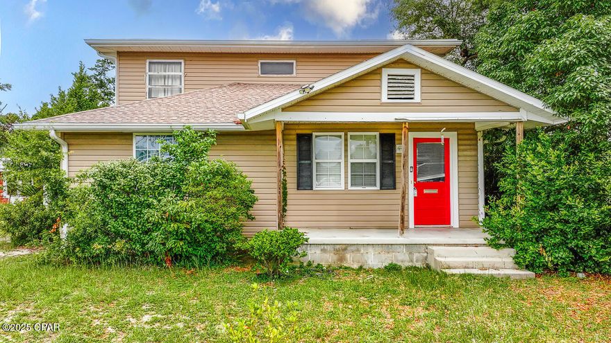 INVESTOR SPECIAL - 2 DOORS, 1 PRICE, HUGE UPSIDE This Panama City property is a true value-add opportunity with multi-income potential. Sitting on a multi-family lot, you'll find a fully functional 3BR/2BA main home that's rent-ready—plus two additional detached structures to be converted into a separate living with a great workshop or storage area. Whether you're building out a rental portfolio or looking for a project with strong equity upside, this setup delivers. The main house features original hardwood floors, paneled walls, a tiled master bath, and all major appliances already in place. Solid bones and city utilities make renovation straightforward. Located in-town and minutes to shopping, schools, and employers, this is an ideal location for long-term tenants. Live in one, rent the other, or bring in steady cash flow from both. Two units. One lot. Endless potential.
