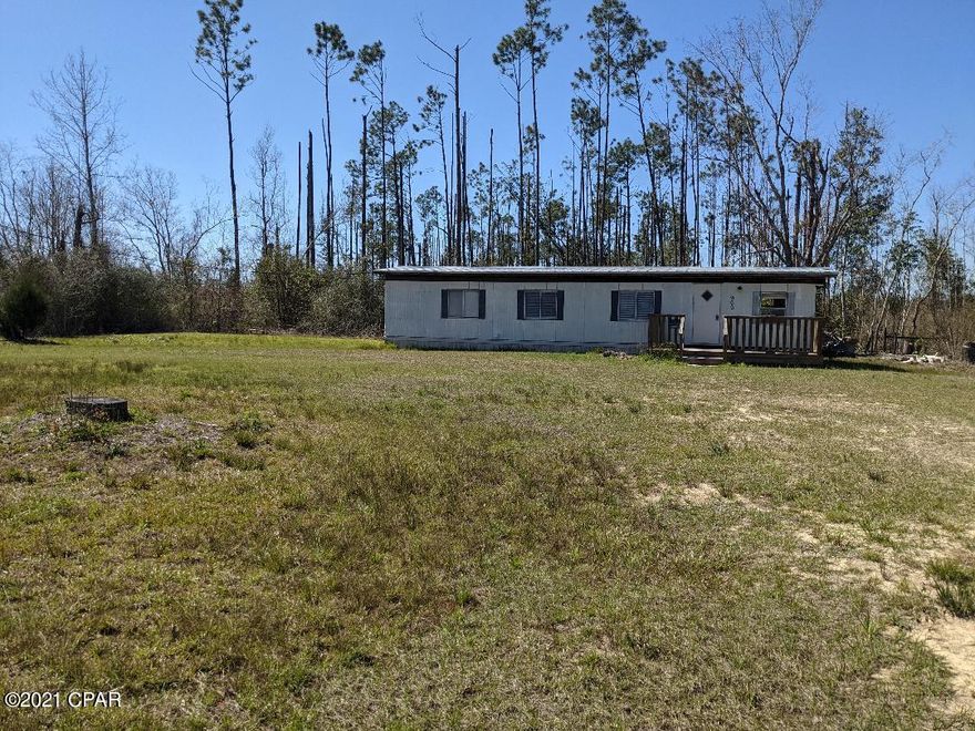 CURRENTLY UNDER CONTRACT,SELLER TAKING BACK UP OFFERS!!! ///ALL SIZES ARE APPROXIMATE, BUYER TO VERIFY//// There is so much potential with this property!! The mobile home is completely livable like it is or you can can live in it while you build your dream home in the back or front of the mobile home!!  Priced to where you can buy this to escape the high cost of rent and plenty room to grow!!!