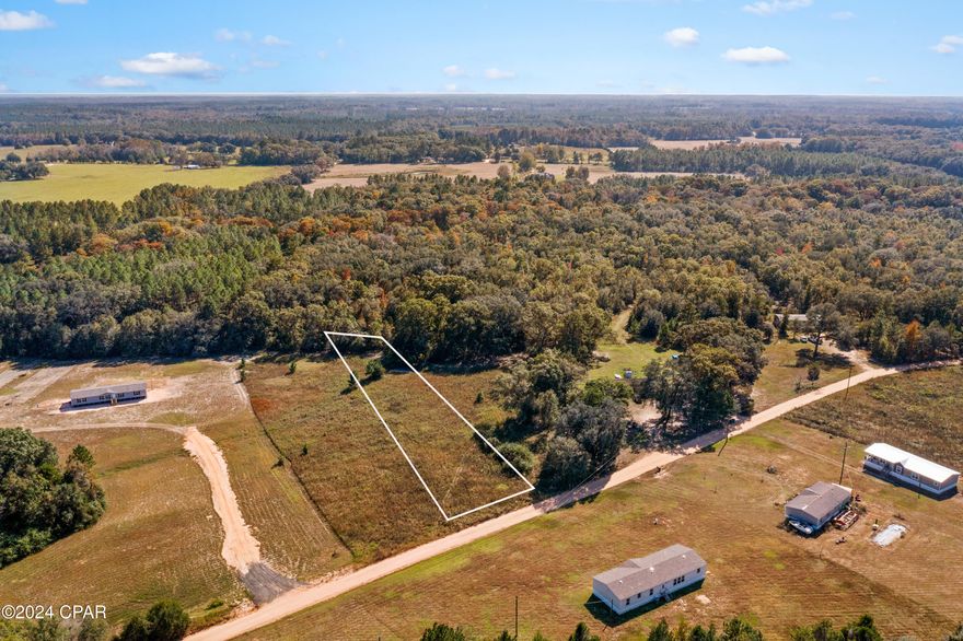 Discover the perfect spot for your dream home on this 1.23+/-acre lot in the Wright's Creek subdivision! This cleared and ready-to-build property offers ample space for your custom site-built or mobile home, providing endless potential to create your ideal living space. Enjoy the best of both worlds with a peaceful, scenic location while staying conveniently close to major destinations—just an hour from the stunning shores of Panama City Beach and 45 minutes to Dothan, Alabama. Don't miss this exceptional opportunity to build the lifestyle you've envisioned!