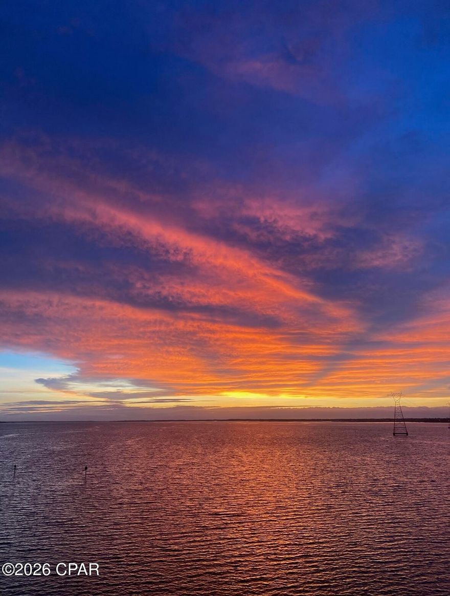 Beautiful 2BR/2BA bayfront-view condo with stunning sunrises! This well-maintained unit offers incredible panoramic views of the bay, where breathtaking sunrise are a daily highlight. The bright and inviting interior features an open living and dining area designed to maximize the scenery, along with new appliances that add modern convenience to the kitchen. Both bathrooms have been upgraded.

The spacious primary suite and comfortable guest bedroom provide plenty of room for residents and visitors alike, making this condo ideal as a primary residence, second home, or investment opportunity.

Residents enjoy excellent community amenities including a sparkling pool, hot tub, fitness center, and a newly added dog park, perfect for pet lovers. This condo shares waterfront with an active marina making it a perfect place to keep your boat. Whether you're relaxing on your balcony taking in the water views or enjoying the community features, this property offers the perfect blend of comfort, convenience, and coastal living.