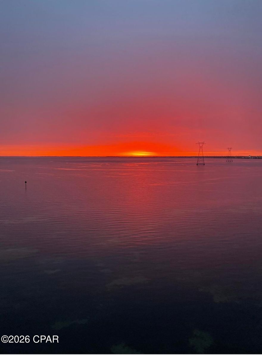 Beautiful 2BR/2BA bayfront-view condo with stunning sunrises! This well-maintained unit offers incredible panoramic views of the bay, where breathtaking sunrise are a daily highlight. The bright and inviting interior features an open living and dining area designed to maximize the scenery, along with new appliances that add modern convenience to the kitchen. Both bathrooms have been upgraded.

The spacious primary suite and comfortable guest bedroom provide plenty of room for residents and visitors alike, making this condo ideal as a primary residence, second home, or investment opportunity.

Residents enjoy excellent community amenities including a sparkling pool, hot tub, fitness center, and a newly added dog park, perfect for pet lovers. This condo shares waterfront with an active marina making it a perfect place to keep your boat. Whether you're relaxing on your balcony taking in the water views or enjoying the community features, this property offers the perfect blend of comfort, convenience, and coastal living.