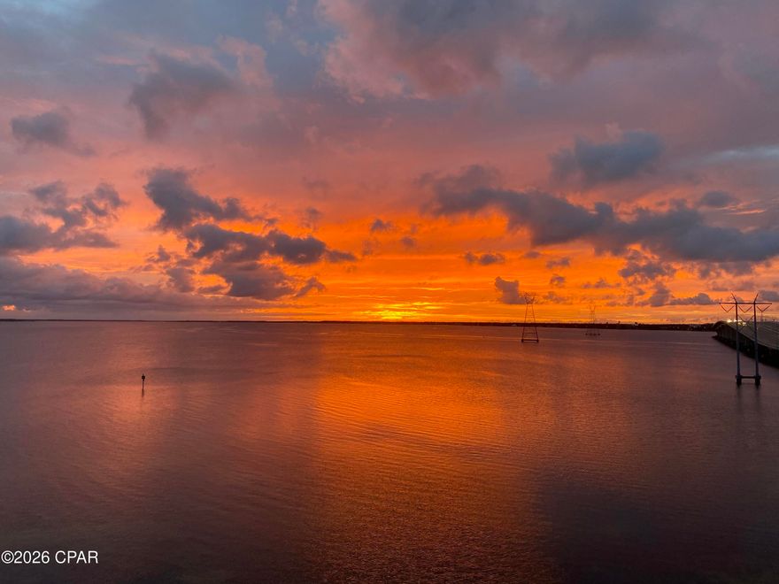 Beautiful 2BR/2BA bayfront-view condo with stunning sunrises! This well-maintained unit offers incredible panoramic views of the bay, where breathtaking sunrise are a daily highlight. The bright and inviting interior features an open living and dining area designed to maximize the scenery, along with new appliances that add modern convenience to the kitchen. Both bathrooms have been upgraded.

The spacious primary suite and comfortable guest bedroom provide plenty of room for residents and visitors alike, making this condo ideal as a primary residence, second home, or investment opportunity.

Residents enjoy excellent community amenities including a sparkling pool, hot tub, fitness center, and a newly added dog park, perfect for pet lovers. This condo shares waterfront with an active marina making it a perfect place to keep your boat. Whether you're relaxing on your balcony taking in the water views or enjoying the community features, this property offers the perfect blend of comfort, convenience, and coastal living.