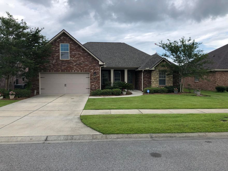 Great house in a great neighborhood with excellent location.  This home is truly move in ready and has four bedrooms and three bathrooms on the 1st floor and a bonus room with a 1/2 bath on the second floor. Open floor plan, a screened in back porch, and pavers on back patio with a gas fire pit. The custom mouldings throughout this home are one of a kind.  New fenced in yard with great views overlooking a pond and wooded  lot.   This very desirable neighborhood has underground utitlites and filled with charm.