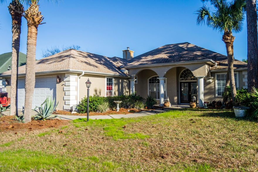 This classy home offers an upscale florida lifestyle in a wonderful Palm Bay neighborhood. Enjoy single story living with a split floor plan. Meal preparation is easy in the spacious kitchen featuring generous cabinet storage and a large breakfast bar. The kitchen opens out to a beautiful window lined breakfast nook--perfect to enjoy a meal while looking out over the pool and landscaping. Relax and let go of your day in the wonderful living room with attractive built-in shelves and cozy fireplace. Entertain guests in the elegant formal dining area, located just off the foyer and within convenient distance to the kitchen. Sleep peacefully in the large master bedroom, boasting sliders looking out over the pool, a walk-in closet, ensuite bath with dual vanities, separate soaking tub and shower, plus commode room. Outside, take a dip in the lanai covered pool or gather for food and drinks on the patio. Also find, extra thick crown molding throughout, great utility room with washer, dryer, and storage, two car garage, and full sprinkler system on a separate meter.