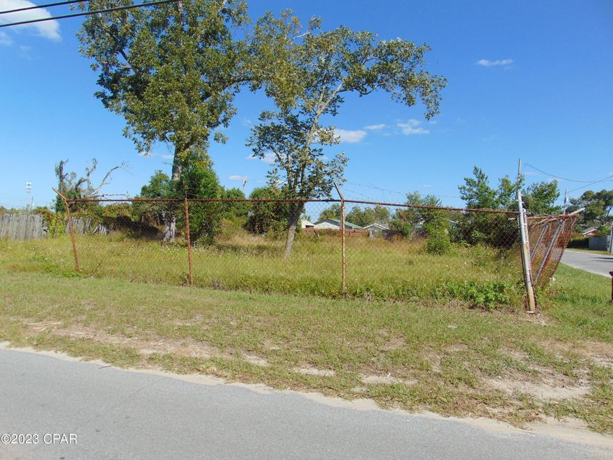 Nice corner lot with all utilities in place which include city water and sewer.  Old mobile home was demolished.  Might be able to place two dwellings on this lot.   High and Dry, close to Tyndall and Business Highway 98.