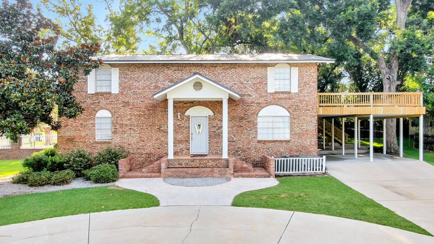 Location Location Location! Awesome 4 Bedroom 2 1/2 Bath home right in the heart of Bonifay! This large all brick, 2 story home is nestled on a beautifully manicured and well maintained corner lot. The home features a newly remodeled kitchen equipped with white custom cabinetry, granite counter-tops, stainless steel appliances, and walk-in pantry. It has an open style concept that flows perfectly from the kitchen to the dining area, and then around into the large living room. Downstairs is equipped with one of the 4 bedrooms that could also be a phenomenal man/she cave, and a half bath. Upstairs holds the 2 guest rooms and full bath, as well as the massive Master Bedroom and Master Bath! Just off the Master Suite is an awesome open deck for social gatherings, or just some plain ole relaxation. The open deck also leads back downstairs to the beautifully shaded back yard that is also equipped with its own quaint yard building. This home has so much to offer, and is sure to move fast! Call to schedule your showing today!
