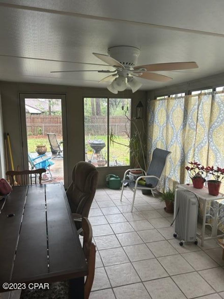 'CURRENTLY UNDER CONTRACT, SELLER WILL CONSIDER BACKUP OFFERS. 2BR/2BA with a bonus/office space in the Grand Lagoon Shores II subdivision. The home has two large bedrooms, two full baths with double vanities, a Florida room, a large laundry with a sink, and a large backyard with fig and citrus trees. The master bath was replaced in 2020 with an updated walk-in shower, and a new water heater was installed in 2022. The home has a large two-car garage, and is under a termite bond with Terminex. This CONVENIENT LOCATION is close to the beach, marinas, shopping, dining, entertainment, and all PCB offers.