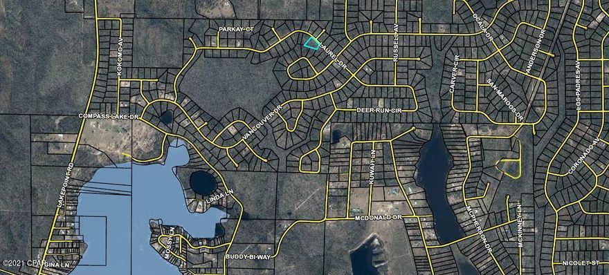 This is one of the nicer, LARGER lots in beautiful Compass Lake in the Hills! As an owner, you have access to Lake McCormick, Compass Lake, and loads of amenities including fishing, canoeing, overnight camping sites, pool, tennis, and more. There are several nice homes in this area. Compass Lake in the Hills is just a short drive south to beautiful Panama City Beach, 15 min. to I-10, and 25 min. to Marianna. There is no HOA fee, however, a voluntary annual maintenance fee of $135 is requested for upkeep of the common areas. No mobile homes allowed. All sizes/info approximate, please verify accordingly.