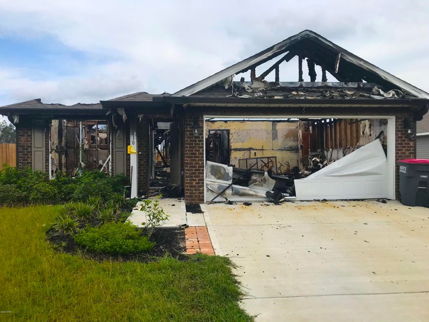 INTERESTING fix & flip or investment opportunity with this brick home in the BRAND NEW subdivision of Magnolia Hills in Panama City! This property is a very unique opportunity - The home (built in 2019 by builder DR Horton) had a home fire, leaving the home considerably damaged. The new neighborhood of Magnolia Hills has only 1 home left unsold currently, with prices ranging $240K and up. This is an opportunity to purchase a lot that is located in a community with no lots available - Or potentially also an opportunity to rebuild the home for a great price with the original builder and existing plans. Your choice! At this price this property will DEFINITELY NOT LAST LONG - So act quickly! --- CASH BUYERS ONLY ---