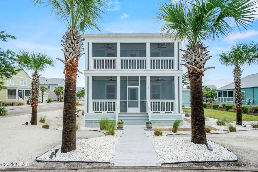 Coastal charm meets casual elegance in a prime location just steps from the beach in the beautiful Windmark beach community!  Polished from top to bottom, this 3BR/2.5BA beach house is situated on an oversized corner lot in one of Port St. Joe's most sought-after communities.  The open-concept layout shines with brand-new porcelain tile and baseboards throughout, designer lighting, new ceiling fans, custom iridescent glass pantry doors, and updated hardware on every door.  The chef's kitchen features a new gas stove, and all bathrooms have been tastefully updated with new vanities, faucets, lighting, and lavatory upgrades. The master bath includes a newly tiled walk-in shower for a spa-like retreat.  This home is being sold stylishly furnished—completely turnkey.  Freshly painted inside and out in a soft coastal palette, the home features all-new exterior ceiling fans, new screens on all three porches, and low-maintenance Bahama rock landscaping that enhances curb appeal and functionality.  Designed for effortless coastal living, the large lot includes an outdoor shower, a detached garage perfect for your golf cart or beach toys, and ample space for a future pool or addition. Enjoy your morning coffee on the screened porch, take in Gulf and Bay views from every floor, and spend your evenings grilling on the brick patio. With easy beach access just steps away, you're perfectly positioned for paddleboarding, fishing at sunrise, or gathering around a bonfire on the sand.  Located in Windmark's Beachside Village, you're just a quick golf cart ride from waterfront dining, boutique shopping, a gym, spa, wine bar, and more. Community amenities include two resort-style pool, clubhouse, walking trails, pet-friendly boardwalks, and deeded beach access. Whether you're seeking a high-performing short-term rental, a dream vacation home, or a full-time coastal retreat, this one checks every box.     Don't miss your chance to own a piece of paradise and live the beach life!