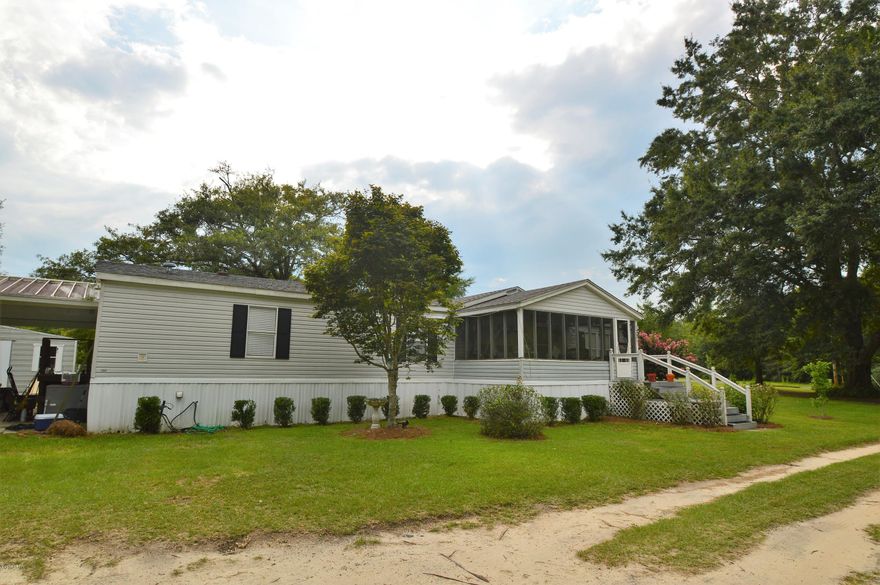 Location is key...Nice doublewide just minutes from Falling Waters Park. Sitting on over 2.3 acres, fenced for animals, chainlinked back yard, large front and rear porches. 3 bedroom with 2 bath plus office space. Living room and den with fireplace. Split bedroom plan. All on quiet cul-de-sac road. new ac 2016, roof 2005. Additional septic tank