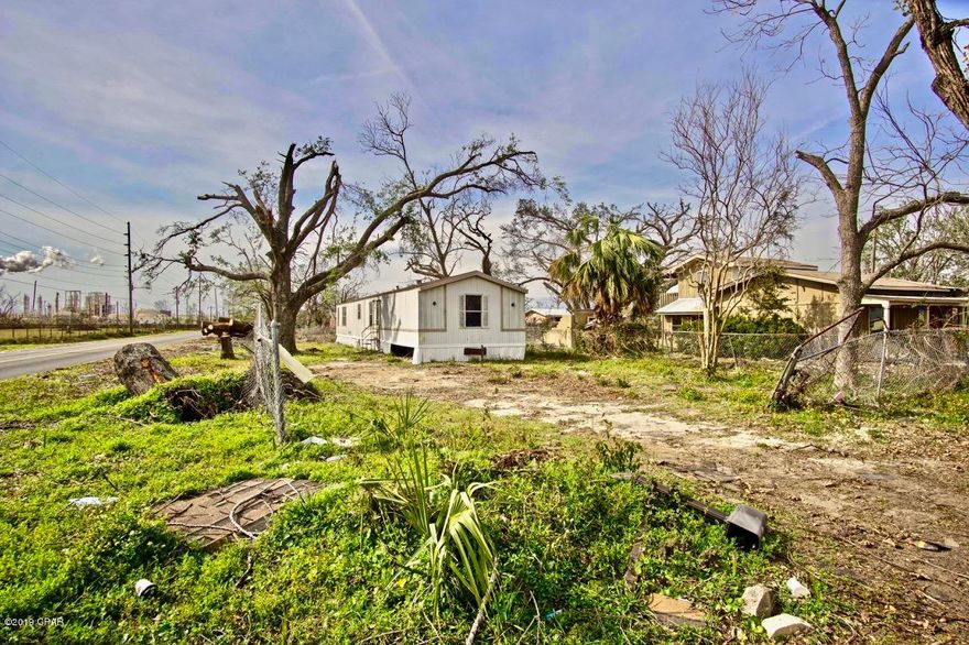 Great lot for a mobile home or a new construction. This corner lot has water and sewer already in place. This centrally located lot already has a fence in place and is ready for its new owner.  Don't miss your opportunity to own this affordable property.