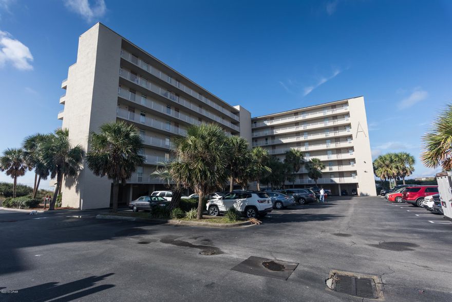 CURRENTLY UNDER CONTRACT, SELLER ACCEPTING BACKUP OFFERS'  Very Nice Dunes of Panama Condo with Breathtaking Views. Condo comes with covered parking and storage.  This 2BR 2BA Fully Furnished. Tiled throughout, carpet in bedrooms.  Gulf Views from Kitchen, Living Room, Dining Room and Master Bedroom. Balcony looks over Pool and Gulf, Just Relax.   This is a wonderful rental investment or great second home. Dunes of Panama has 3 pools, tennis, shuffleboard, fitness room, game room and a place to grill. All dimensions are approx.