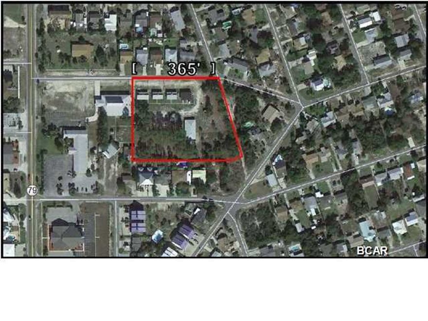 Incredible Opportunity to own almost three (3) acres near Hwy 79, zoned for up to 40 units per acre. Currently has 6 (six) structures on site. Each structure was built in the 1950's and Range in size from 1,000 sf - 3,500 sf. Made of block with asphalt shingle roof. No intrinsic value given for the structures. Property is ideally located just south of PCB Pkwy on the Eastside of Hwy 79. Less than 1/2 mile from City Hall, Fire Department, Police Department, Winn Dixie Shopping Center, Gas stations and many motels & restaurants. Plus only five minutes to Pier Park, Frank Brown Park and the City Pier This property is zoned for up to 40 units per acre for multi-family development and would make an ideal location for retirement center, motel, and townhome development. All major utilities  are available. Estimated be over 8,200 cars per day or almost 3 MIL per year.