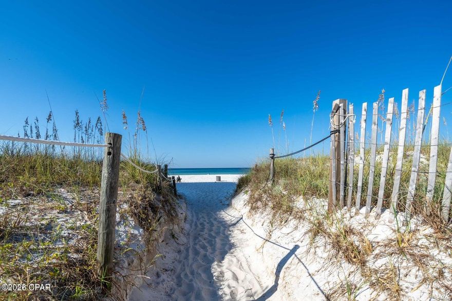 Welcome to this RARE, perfect beach getaway in beautiful Panama City Beach! SHORT STEPS AWAY  rom the sugar-white sands and emerald waters!! This beautifully renovated 2-bedroom, 2.5-bath townhome offers the ideal blend of relaxation, convenience, and investment potential. With accommodations for up to 6 guests thanks to a sleeper sofa, this property is perfectly suited as a vacation home, second residence, or income-producing rental. 

Inside, you'll find updated finishes, comfortable living spaces, and a welcoming coastal atmosphere designed for memorable getaways. The well-maintained community features lush green space, a refreshing pool, and a peaceful setting just moments from the beach.

Enjoy unbeatable location perks with two public beach access points just steps away, plus easy walking distance to the famous Schooners beachfront restaurant -- known as ''the last local beach club.'' Spend your days soaking up the sun,, fishing, or enjoying breathtaking sunsets right outside your door.

Beyond the beach, Panama City Beach offers endless attractions and entertainment for owners and guests alike. Explore shopping, dining, nightlife or enjoy family adventures at Shipwreck Island Waterpark, or discover marine life and outdoor activities at St. Andrews State Park. From golf courses and deep-sea fishing to dolphin tours and live entertainment, there's something for everyone year-round.

Whether you're searching for your own slice of paradise along the world-famous Emerald Coast or adding a strong performer to your real estate portfolio, this turnkey beach townhome is an opportunity you won't want to miss.