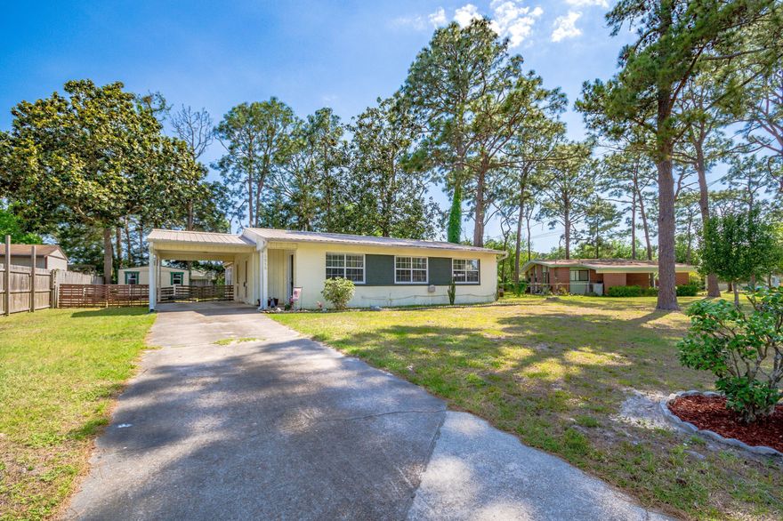 CURRENTLY UNDER CONTRACT, SELLER ACCEPTING BACKUP OFFERS  Location, Location, Location! This home is close to shopping, Hospitals, entertainment and bus stops. This home is not in a flood zone and perfect for a first time home owner, with solid block construction and a metal roof this home is built to be worry free. With 3 bedrooms and 2 seaport sitting areas it is ideal for a multitude of uses. In the kitchen you will find a sitting area and plenty of solid counter tops and work spaces. In the back yard there is a large shed and room for any number of activity's weather under the large magnolia trees or in the grassy yard spaces.